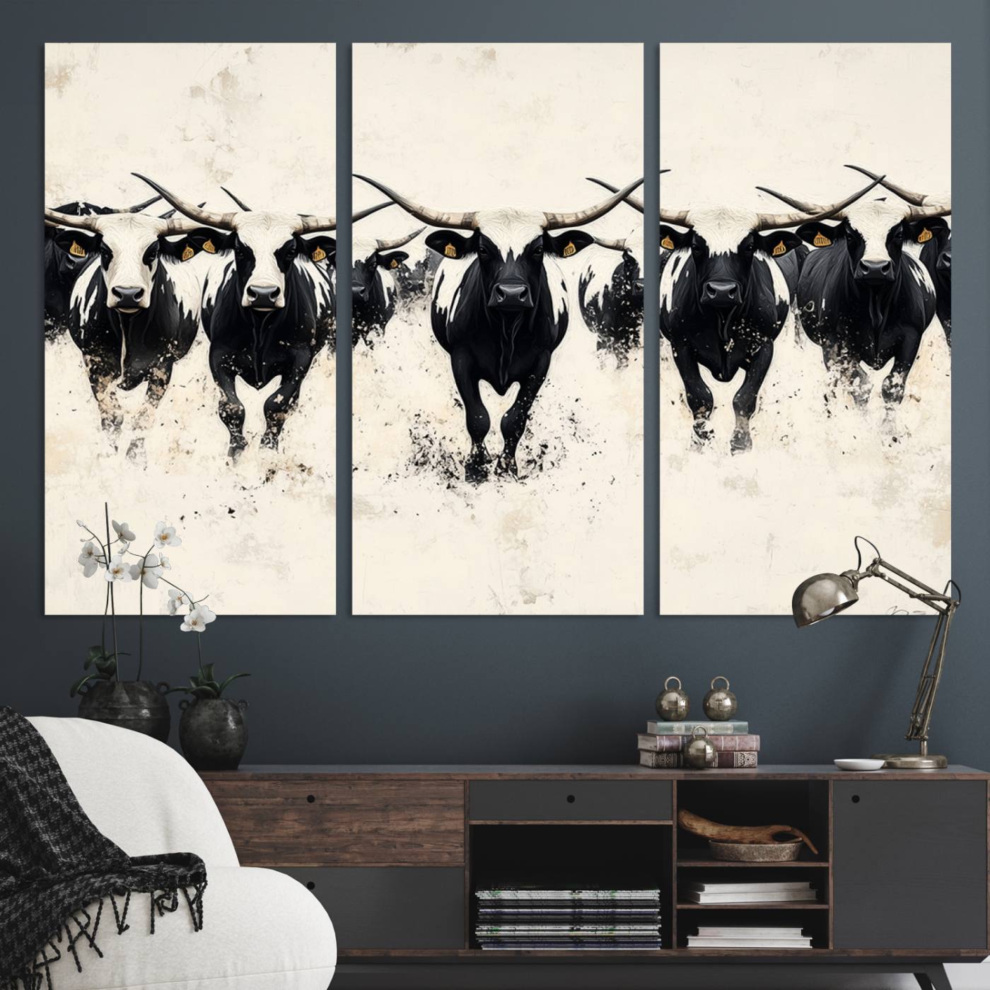 Canvas artwork of black and white Texas longhorns in a bold stampede over a minimalist background, ideal for rustic modern or Western-themed decor.