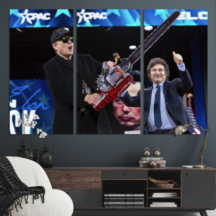 The wall art in the living room is an Elon Musk Chainsaw Art Print, depicting two men with chainsaws on stage in front of a vibrant crowd.