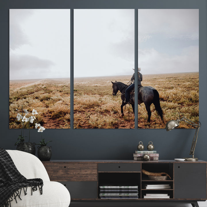 A lone cowboy riding horseback across an open prairie under a vast sky, capturing the rugged and timeless spirit of the Western frontier.