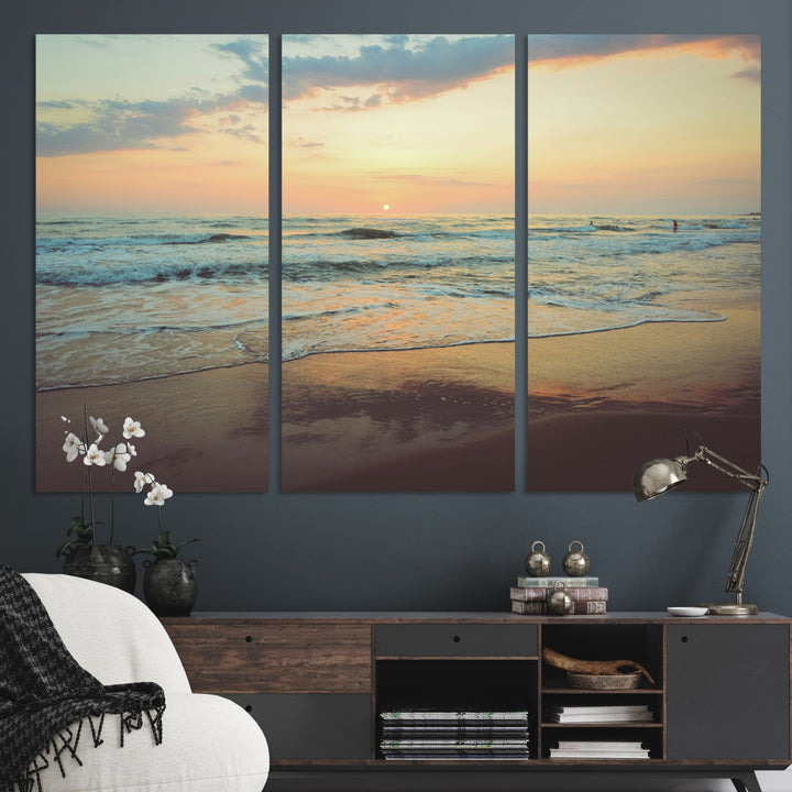 Warm sunset over gentle ocean waves with pastel sky and reflections on wet sand, creating a calm and soothing beach ambiance.