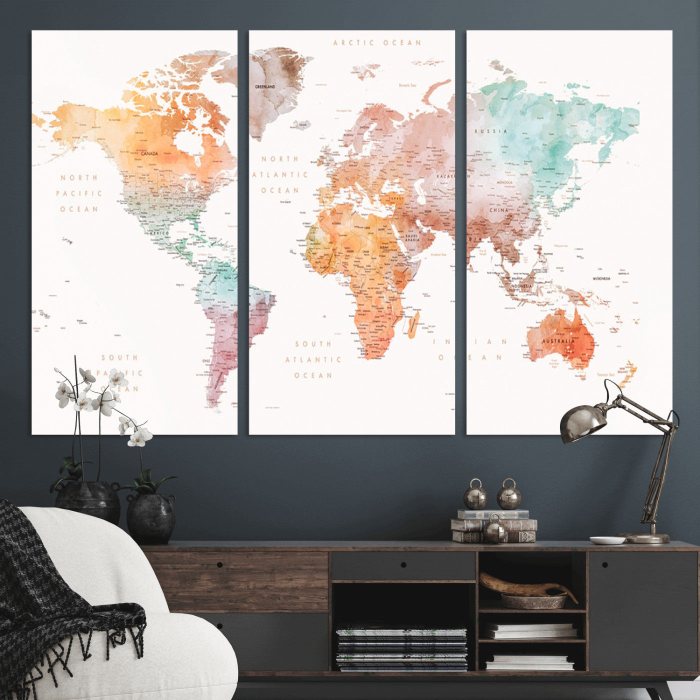 Watercolor world map featuring soft pastel hues in orange, green, blue, and purple on a light background, printed on canvas for vibrant and artistic wall decor.