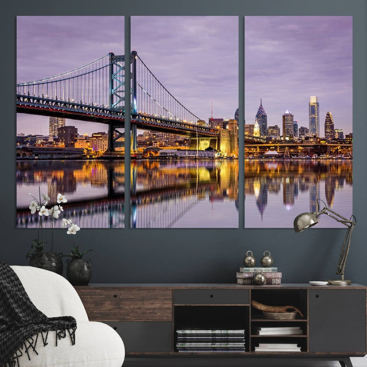 A woman holds the Philadelphia Ben Franklin Bridge Wall Art Canvas Print, a gallery-quality photo showcasing a city skyline with the bridge reflecting on the river. This stunning piece would make an excellent addition as premium canvas wall art for any home.