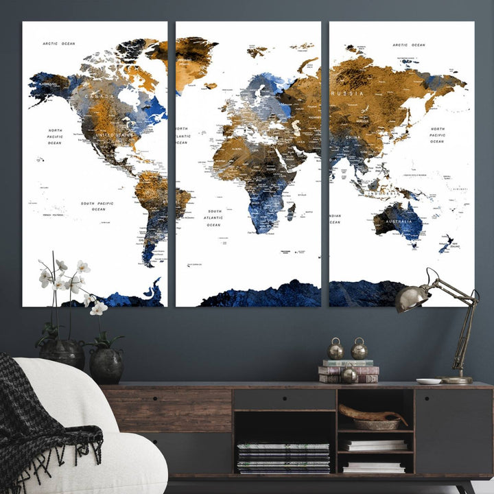 The Triptych Modern World Map Canvas in blue and brown is an ideal global decor piece for enhancing living rooms or offices. It comes ready to hang.