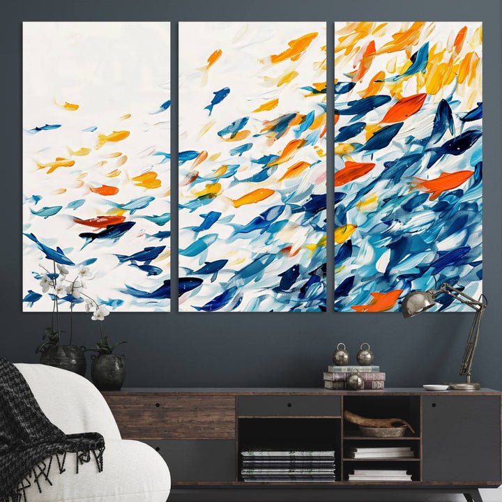 A colorful Abstract Fish Shoal Canvas Print hangs on the wall.