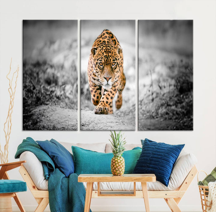 A striking three-panel "Jaguar Stalking Wall Art Canvas Print - Majestic Big Cat in Focused Pursuit" features a leopard walking forward, set against a black and white background.