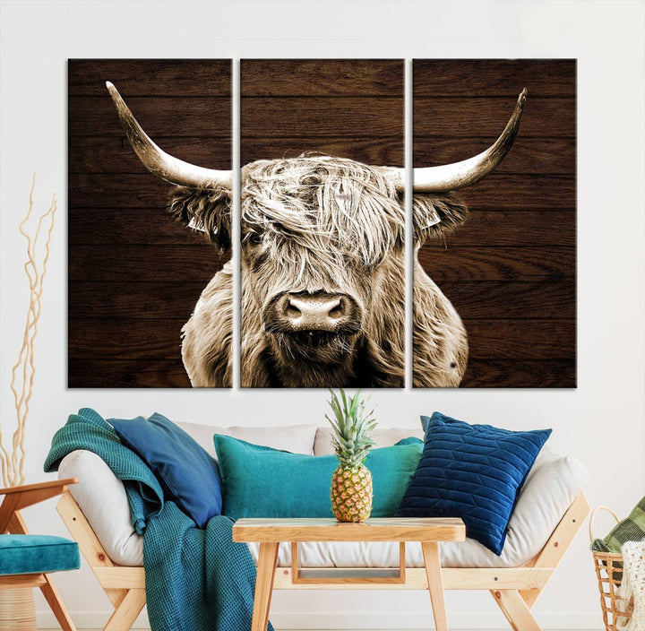 Highland Cow Wall Art Canvas Print: Majestic Scottish bull on rustic decor, ready to hang.