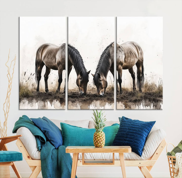 A Chinese Ink Style Horses Wall Art Canvas Print featuring two horses grazing is displayed in a modern setting.