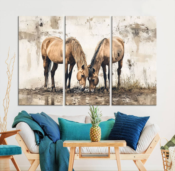 The Vintage Horses Wall Art, a ready-to-hang and framed triptych, beautifully captures two horses gracefully grazing. It perfectly complements the rustic charm of western farmhouse wall decor.