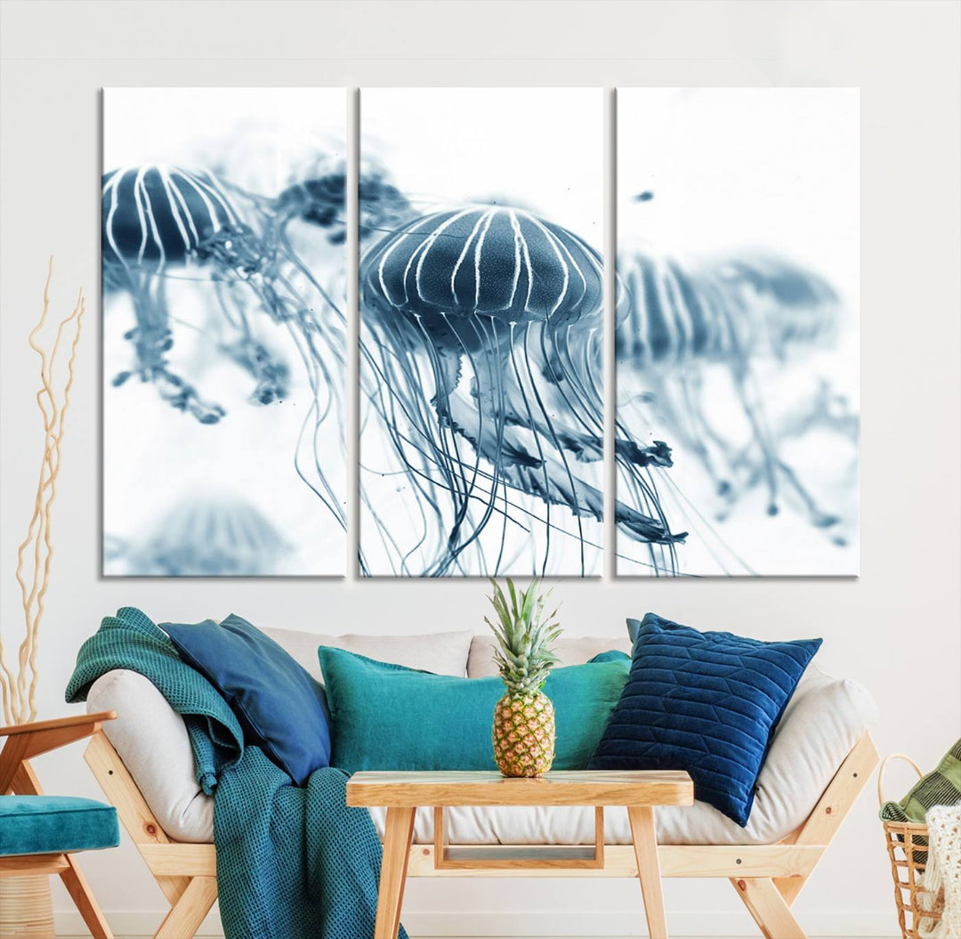 The Abstract Jellyfish Wall Art Canvas Print, a three-panel piece featuring high-resolution printing, hangs elegantly in the room, adding vibrant detail to the space.