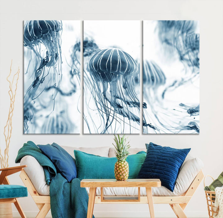 The "Abstract Jellyfish Wall Art Canvas Print" in high resolution is beautifully displayed as a triptych on a dark wall. Experience museum-quality canvas and enjoy free shipping with this stunning piece.