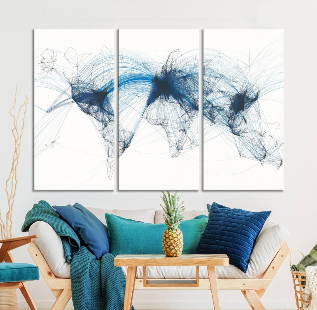 The Aviation Flight Map Wall Art is a set of three abstract panels featuring a world map with blue lines, resembling a flight map. Ideal for aviation enthusiasts, this ready-to-hang framed air traffic art print enhances the appeal of modern decor.