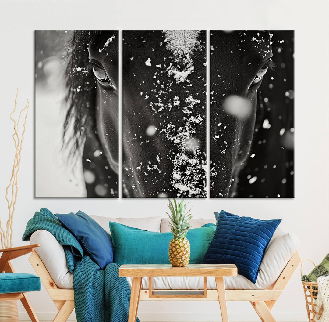 The Winter Horse Snow Wall Art Canvas Print, a black and white triptych showcasing a snow-covered horse's face, infuses the space with rustic cabin decor.