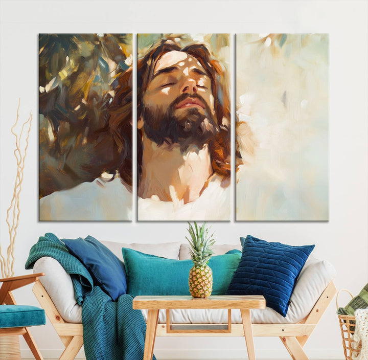 The Jesus Portrait Wall Art Canvas Print features a depiction of Jesus Christ with closed eyes, basking in sunlight. His expression exudes a peaceful, spiritual atmosphere against a blurred background.