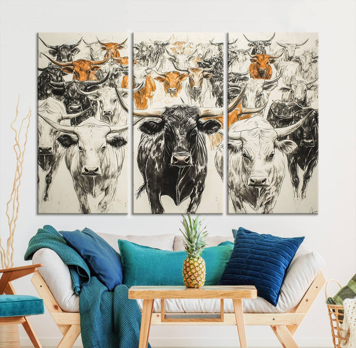 This exquisite farmhouse wall art, titled "Western Longhorn Cattle Canvas Print," showcases a majestic herd of longhorn cattle in a three-panel design. This ready-to-hang and framed barn decor infuses your space with rustic charm.