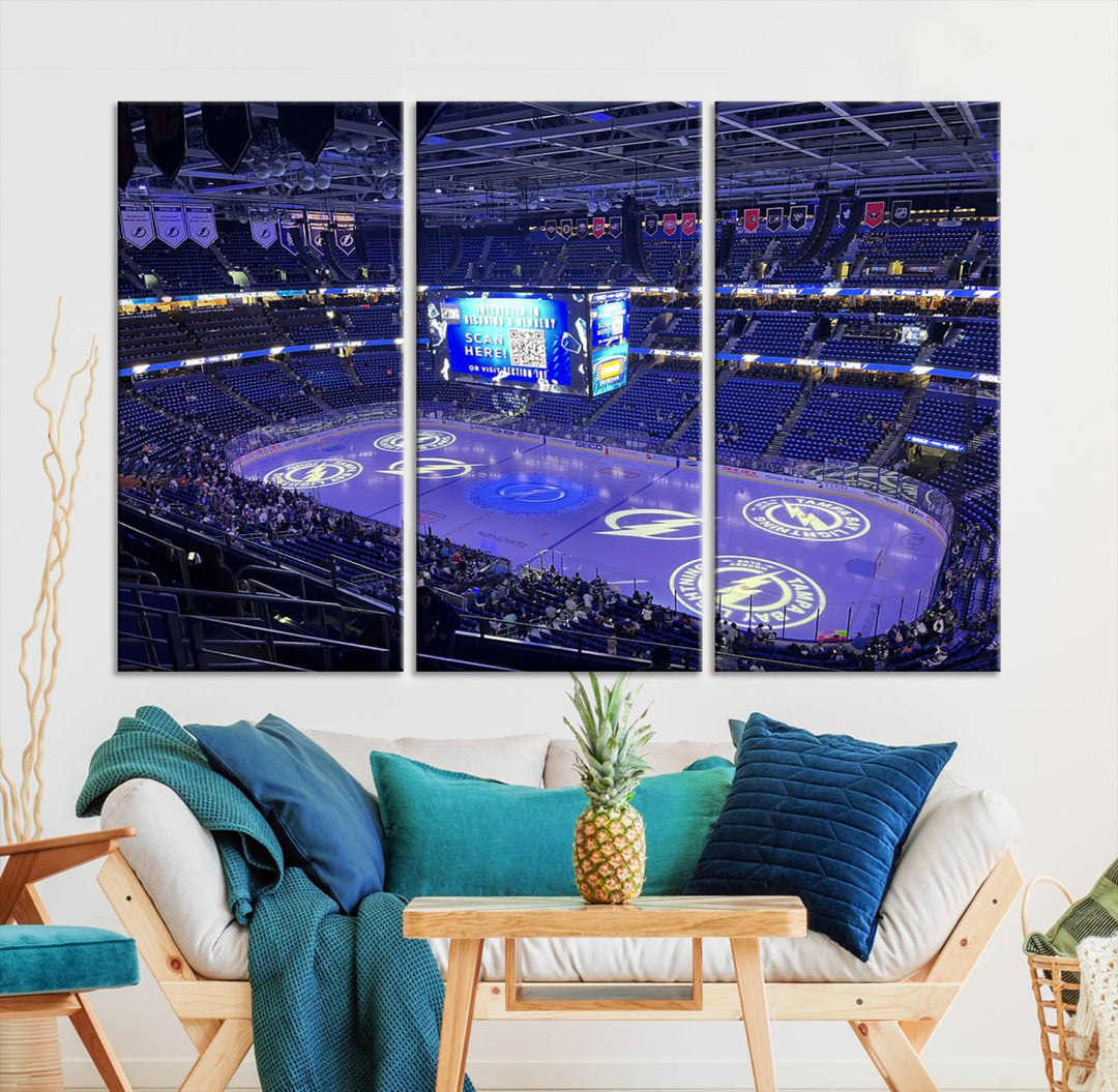 The wall art canvas print at Amalie Arena features team logos on ice, encapsulating the vibrant atmosphere of an NHL hockey stadium.