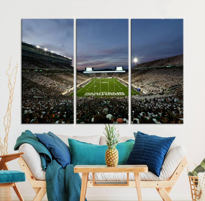 Wall art featuring a stadium at dusk with full stands—ideal for the Michigan State Spartans Football Team Canvas Print.