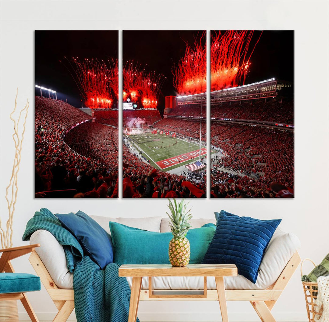 A vibrant red canvas art of a packed Ohio State Buckeyes stadium at night with fireworks.