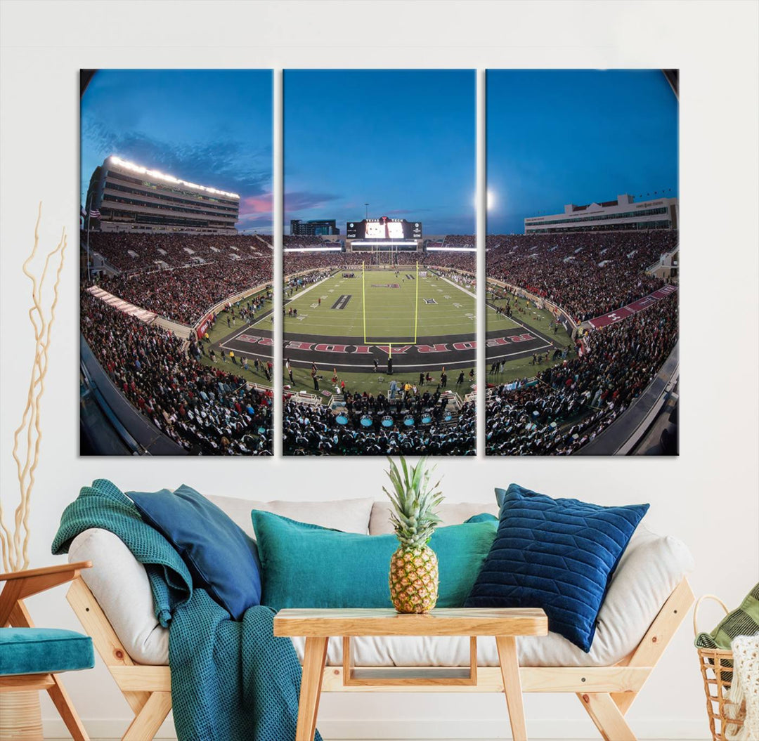 The wall art in the living room features a Texas Tech Red Raiders Football Team Print, showcasing Jones AT&T Stadium at dusk.