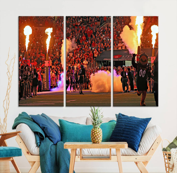 This canvas print captures the UTSA Roadrunners storming the Alamodome under smoke and fire.