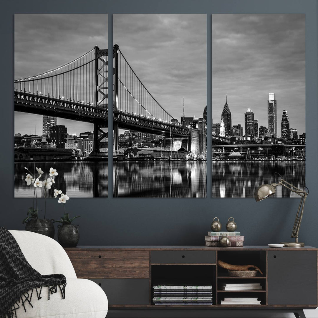 The "Large Wall Art Philadelphia Canvas Print" showcases a black-and-white depiction of the Ben Franklin Bridge with a water reflection.