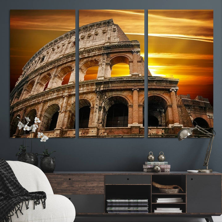 On the wall, theres a piece of art titled Colosseum with Yellow Sunset Behind, Italy.