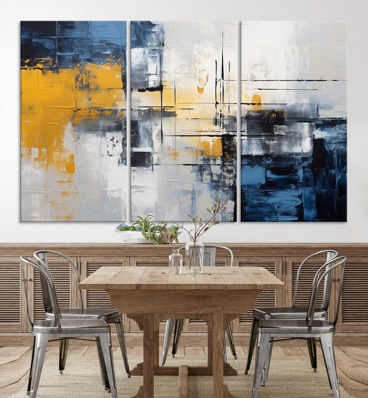 The Yellow Orange Blue Abstract Wall Art Print on gallery-wrapped, museum-quality canvases adds a vibrant touch to the room.