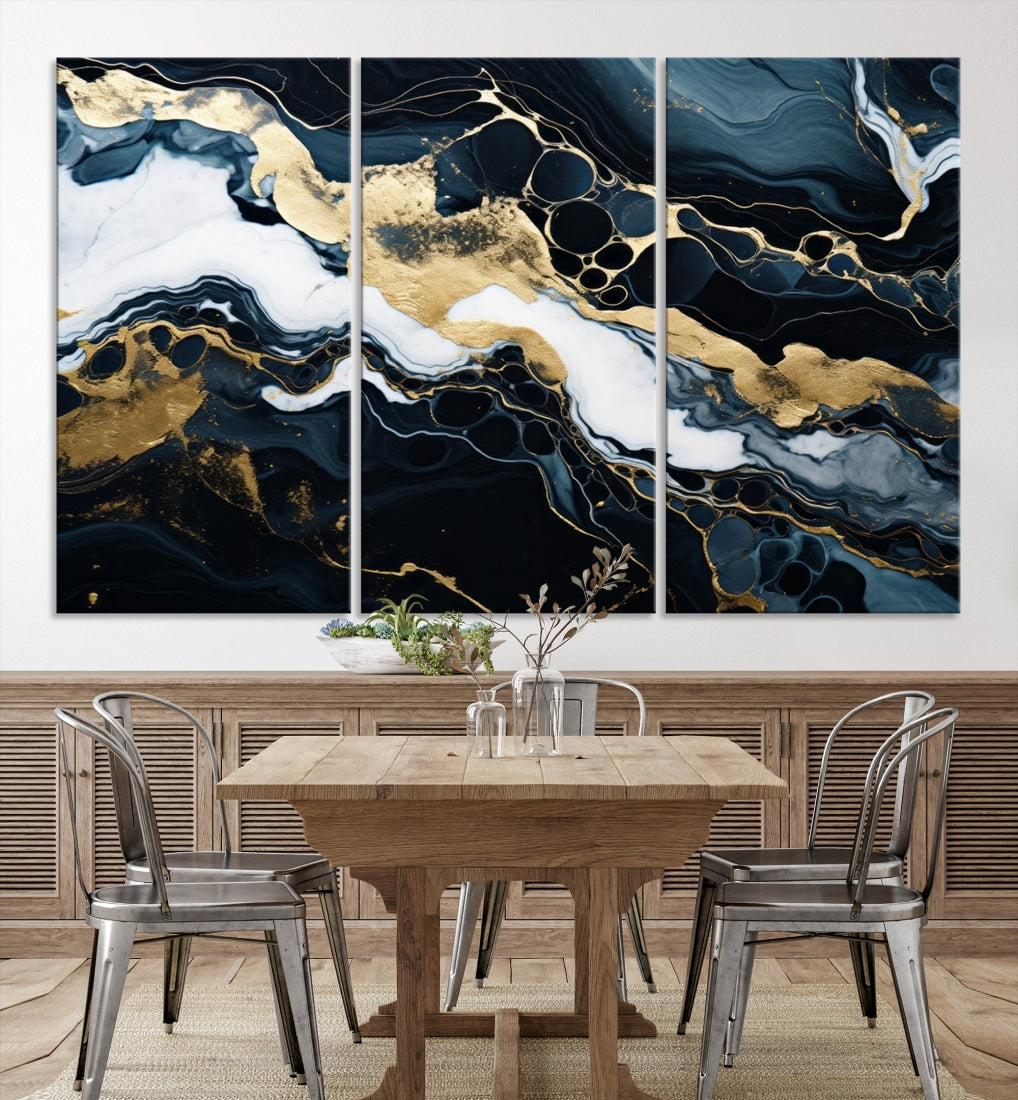 Fluid Marble Abstract Wall Art Print, a contemporary piece with black, white, and gold swirls on museum-quality canvas.