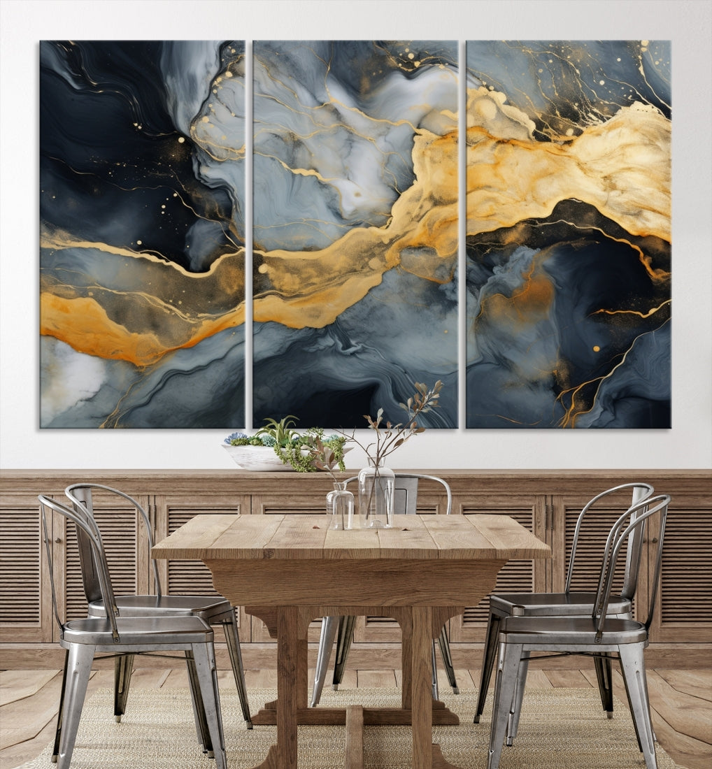 The living room features the Golden Gray Abstract Wall Art Print Contemporary Art Canvas Design, a triptych showcasing gold, black, and gray swirls. Crafted on museum-quality canvas and ready to hang, this piece is designed for elegance and durability.