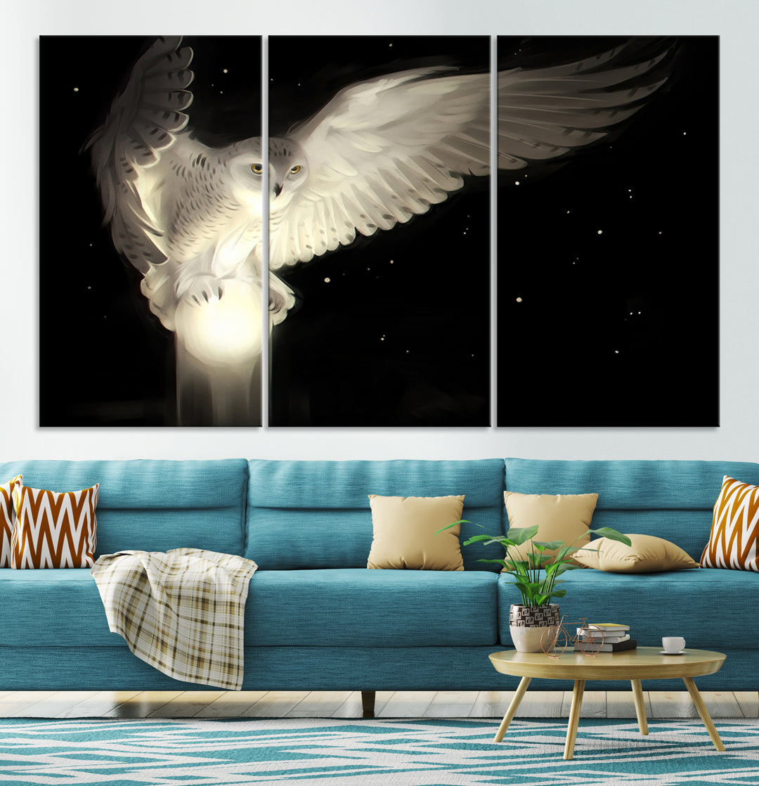 The Night Owl Art graces the wall with its depiction of a snowy owl on a glowing orb, perfect for modern decor.