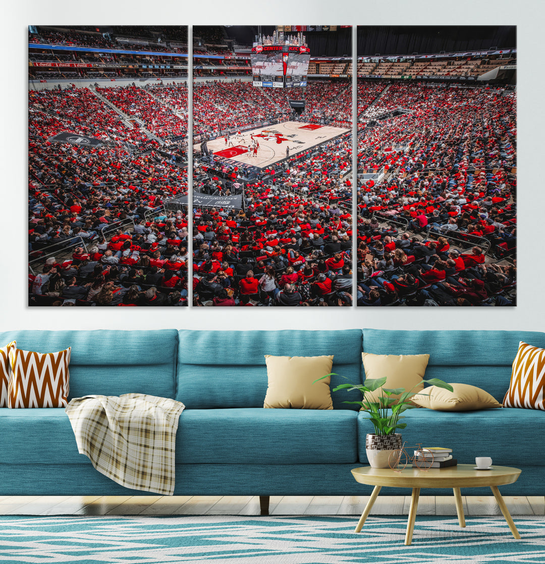 A painting of Louisville Cardinals fans in red at the KFC Yum Center Arena.