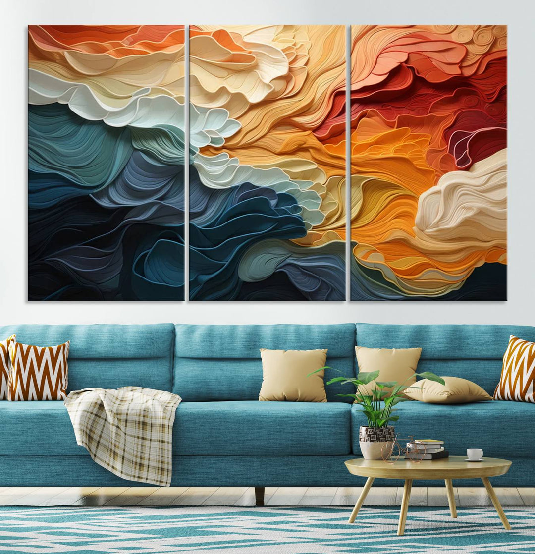 A Blue Orange Abstract Wave Wall Art Canvas Print adorns the wall. This colorful masterpiece is professionally hand-assembled to enhance any space.