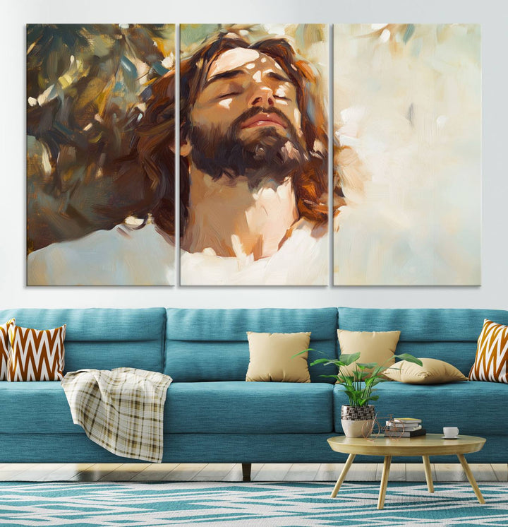 The Jesus Portrait Wall Art Canvas Print features a depiction of Jesus Christ with closed eyes, basking in sunlight. His expression exudes a peaceful, spiritual atmosphere against a blurred background.