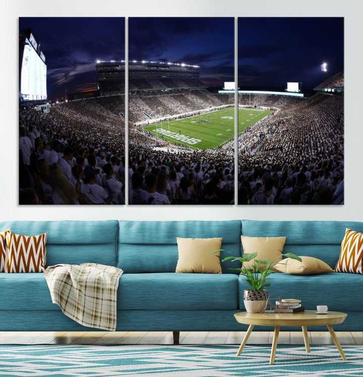 A packed football stadium at night, with bright lights and fans in white, depicted in a Michigan State Spartans Stadium wall art.