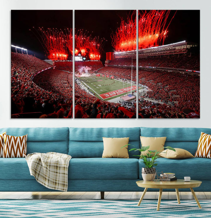 A vibrant red canvas art of a packed Ohio State Buckeyes stadium at night with fireworks.