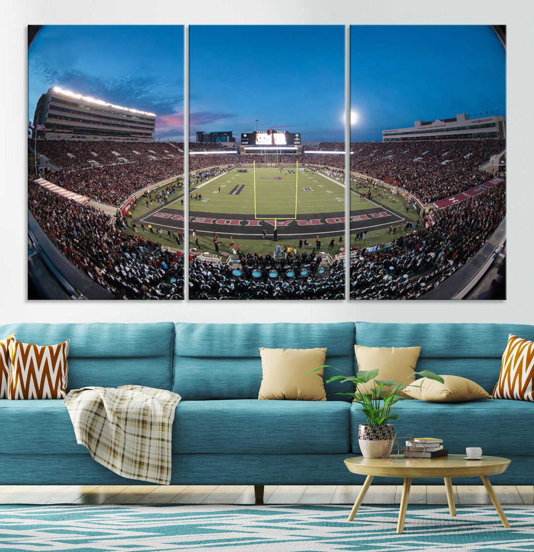 The wall art in the living room features a Texas Tech Red Raiders Football Team Print, showcasing Jones AT&T Stadium at dusk.