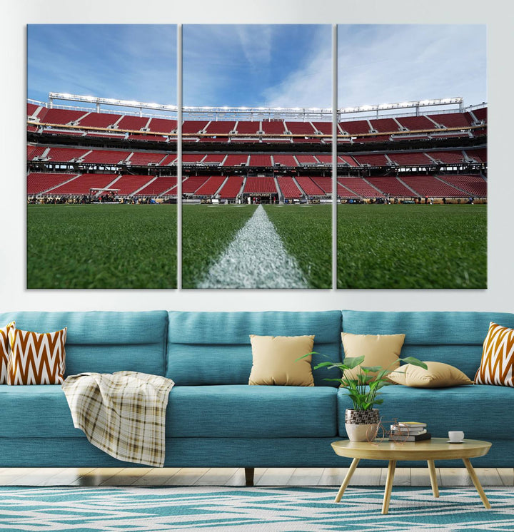 A canvas print of the University of Tulsa Golden Hurricane showcases H.A. Chapman Stadiums football field and red seats against a backdrop of a blue sky.