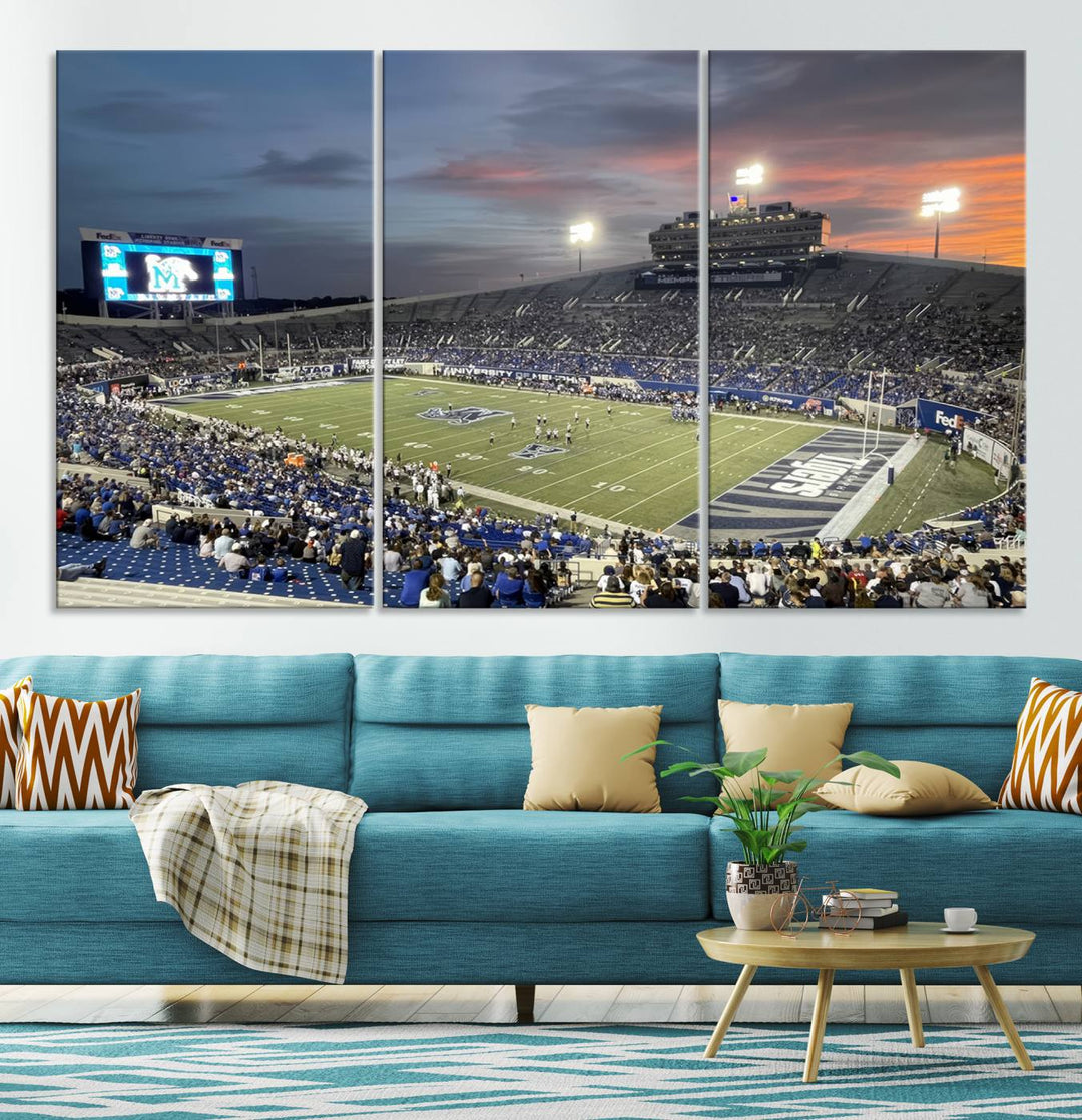 A Memphis Tigers football canvas print of Simmons Bank Liberty Stadium at sunset enhances the living room.