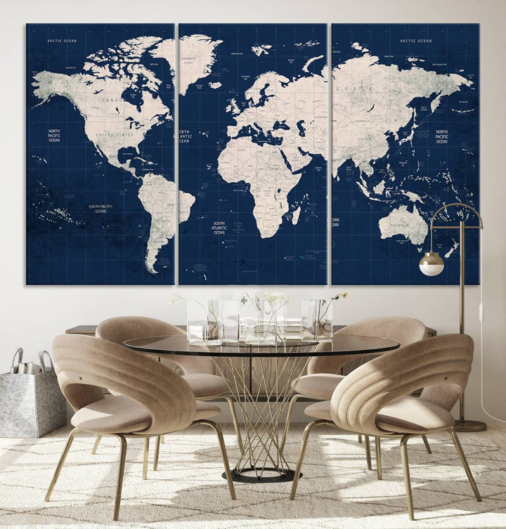 Large modern world map wall art canvas print in beige and navy; showcases a 3-panel vintage map design and is ready to hang.