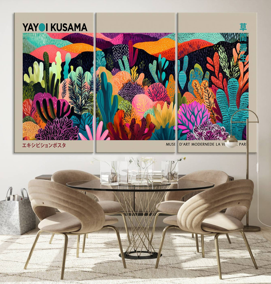 The framed Yayoi Kusama wall art adds vibrancy above the blue couch.