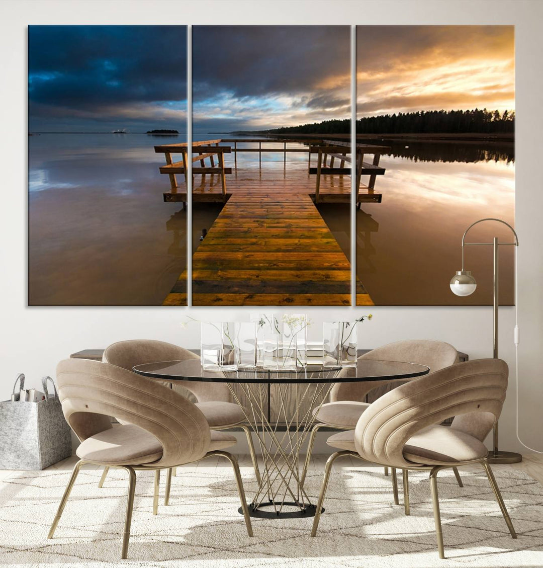 The "Serene Lake Pier at Sunset" landscape canvas print, crafted as ready-to-hang and framed wall art, enriches the contemporary setting by capturing the tranquility of a lakeside pier at sunset.