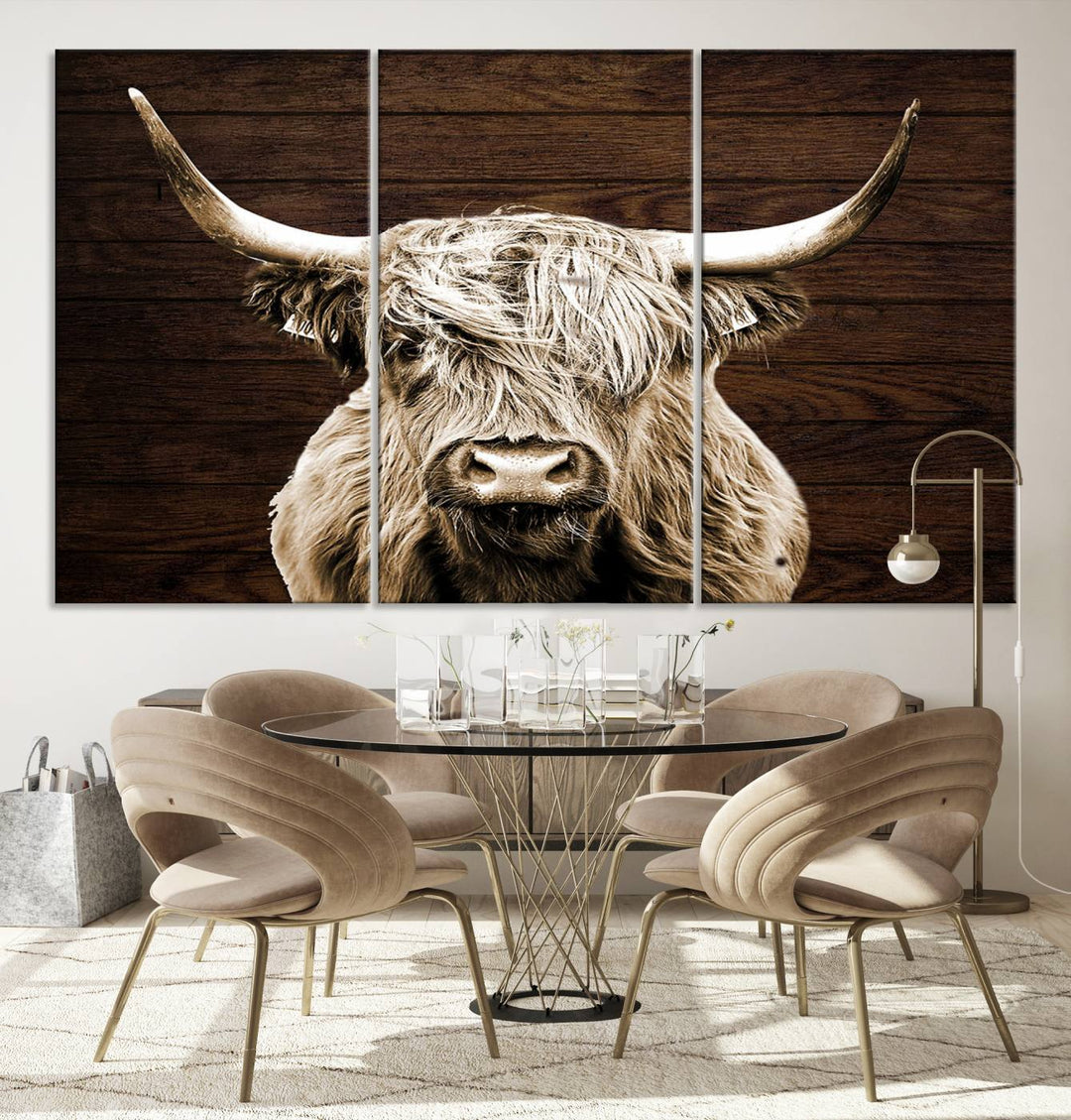 Highland Cow Wall Art Canvas Print: Majestic Scottish bull on rustic decor, ready to hang.