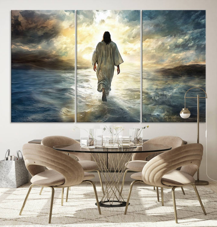 The Jesus Walking on Water Wall Art, a captivating triptych canvas print, showcases a person walking on water beneath dramatic clouds. This ready-to-hang piece seamlessly combines faith and style for your Christian home decor.