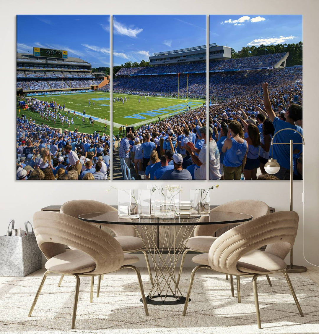 A gallery-quality canvas wall art print featuring the University of North Carolina Tar Heels Football Team and Chapel Hill's Kenan Memorial Stadium adorns the cafe wall.