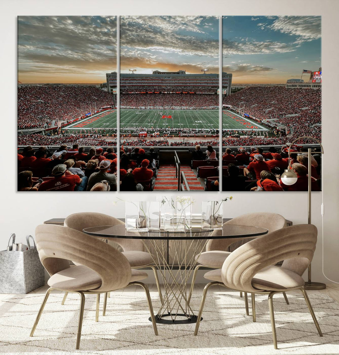 The living room features a stunning triptych of Lincoln Memorial Stadium wall art canvas print, celebrating the University of Nebraska Cornhuskers football team. This piece serves as captivating wall art, showcasing a gallery-quality finish.