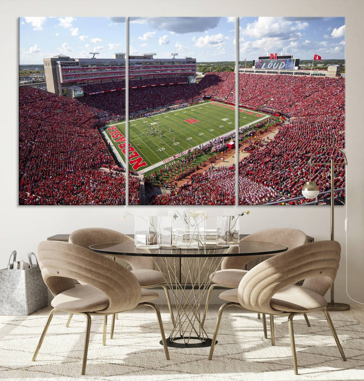 The University of Nebraska Cornhuskers Football Team Print showcases a vibrant triptych of Lincoln Memorial Stadium, depicting a packed football stadium filled with energetic fans. This handmade art piece is crafted in the USA and printed on premium canvas for a gallery-quality finish.