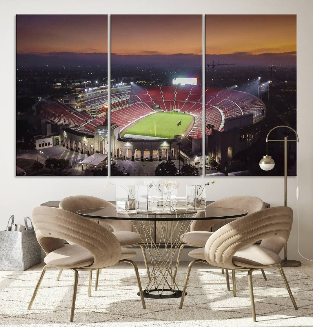 The USC Trojans Stadium canvas captures Memorial Coliseum at twilight, showcasing red seats and a green field beneath an orange sky.