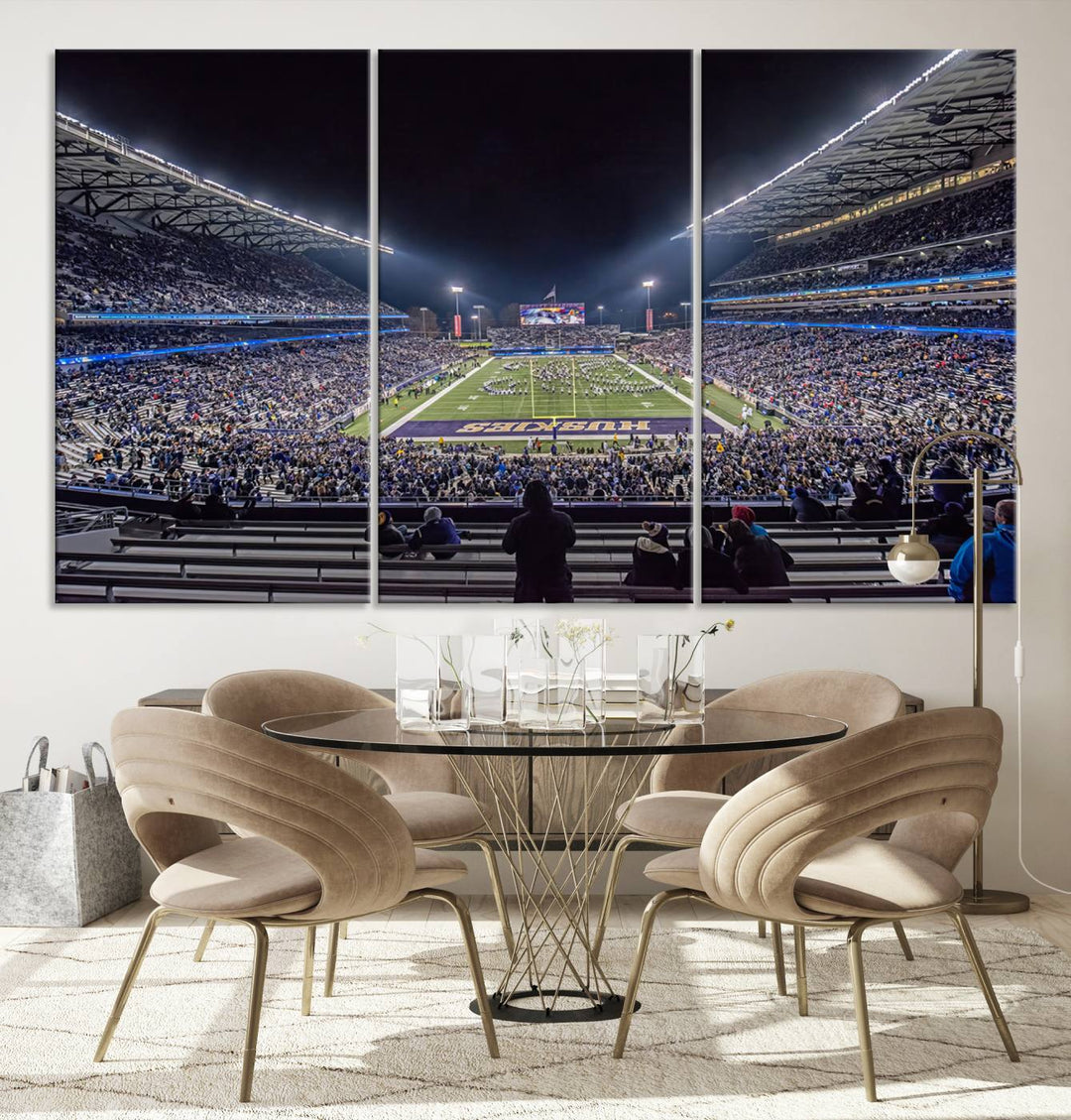 A canvas print titled The University of Washington Huskies Football depicts a packed Husky Stadium at night, as seen from the stands.