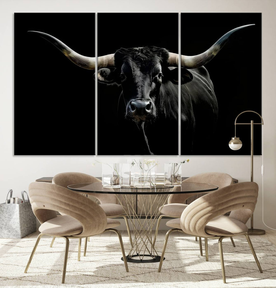 The Texas Black Longhorn Bull Canvas Print, featuring large curved horns set against a dark background, is ideal for Western decor.