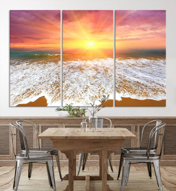 Golden Beach Sunrise 3-panel canvas art of ocean waves, hung on a wooden wall.