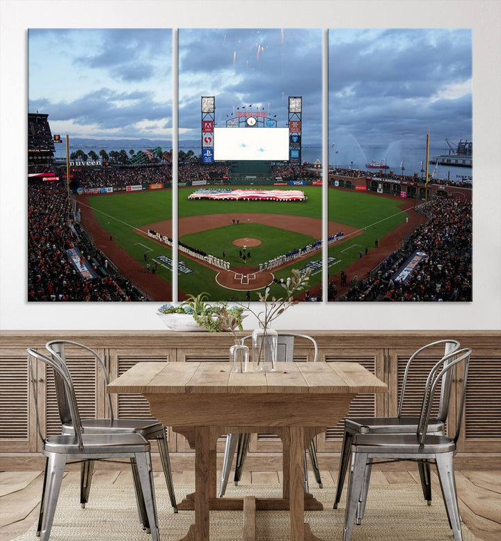 This framed 3-panel canvas MLB wall art features a giant flag and fans under a cloudy sky at Oracle Park.